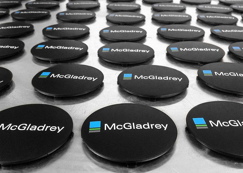 Custom Printed Badges | Pad & Screen Printing for Branding and ID