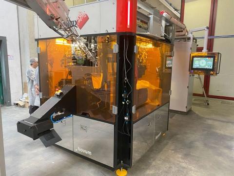 Close-up of the Quantix NOVUM digital printing machine with touchscreen controls, ideal for industrial digital printing applications.