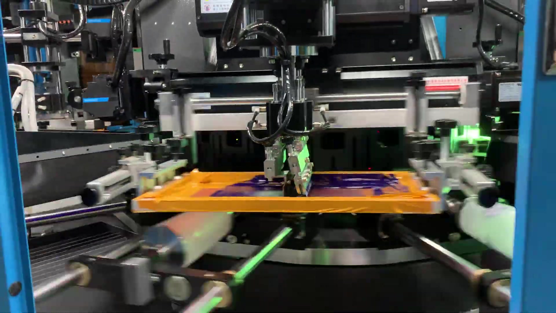 DT-CNC screen printing station with print head, screen frame and rotary fixture