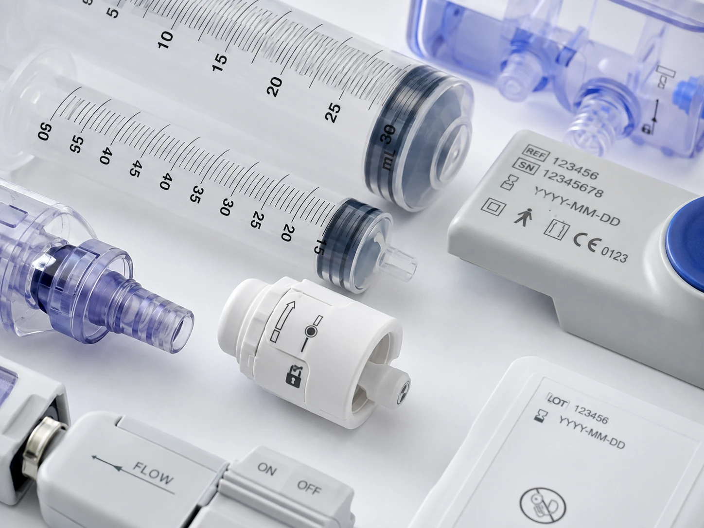 Pad printed medical device components with graduations, symbols and identification markings